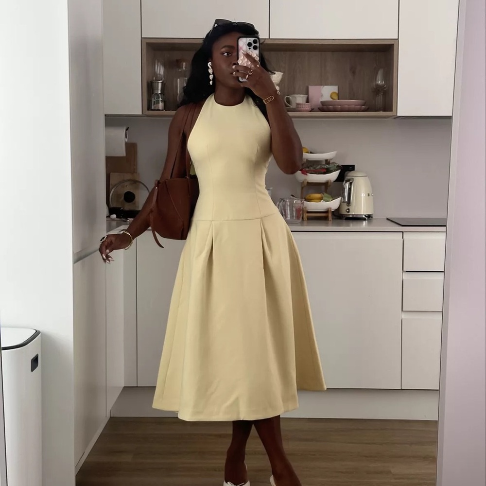 Sleeveless Cream Midi Dress with Flared Skirt
